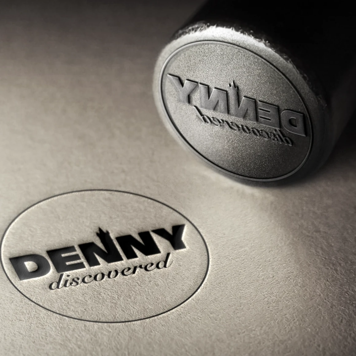 Harnessing Place Brand Value Denny Discovered Metal stamp logo